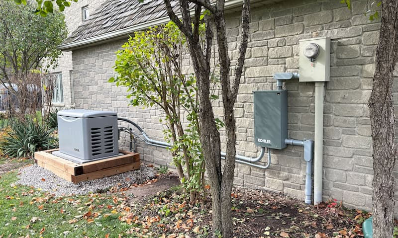 A transfer switch installed outside.
