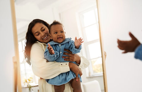 nanny and baby having fun
