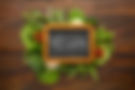 top-view-green-veggies-with-vegan-lettering-chalkboard