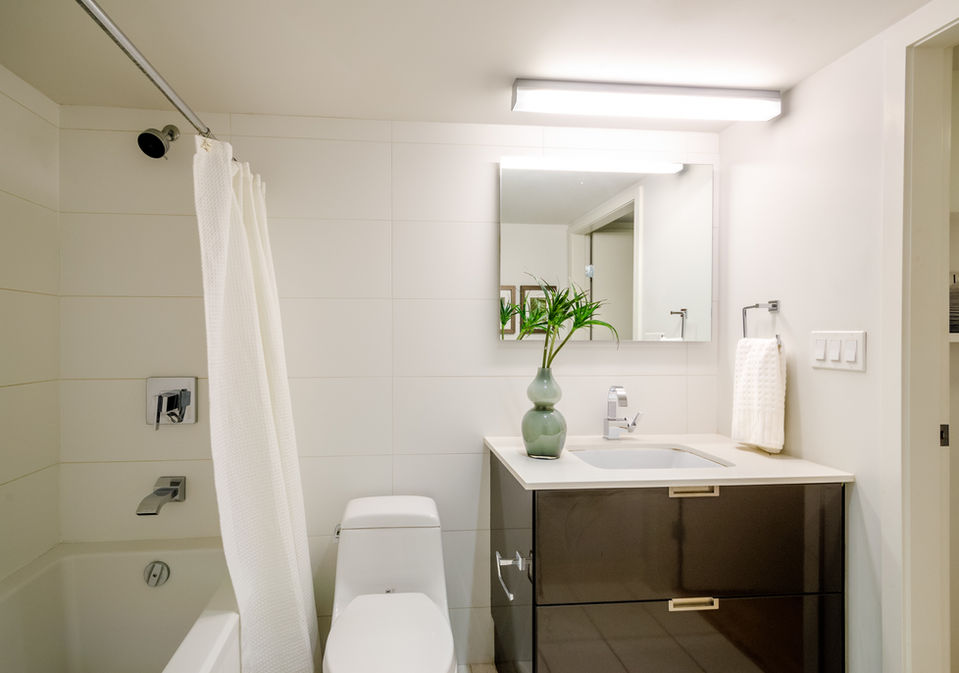 Toilet, sink, and tub all scrubbed