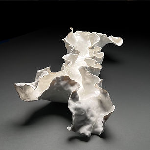 #1660, After the Rains IV. Ceramic art sculpture in porcelain finished in high gloss white glaze. 21" x 9" x 4.5".