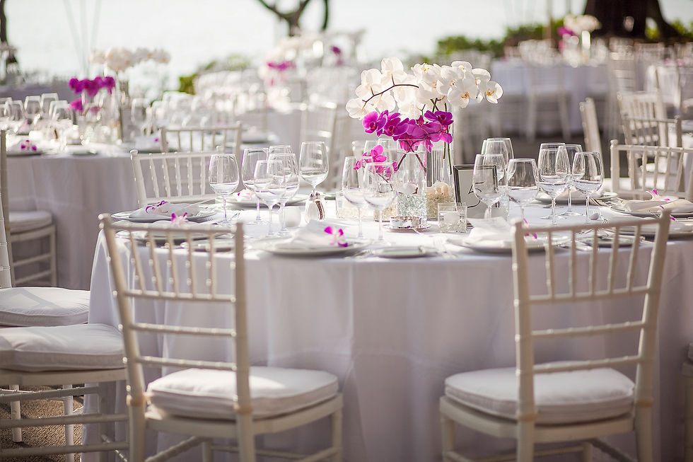 Orchid centerpiece at an outdoor event or wedding reception