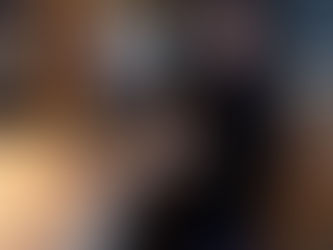 A waiter checking orders on an epos system