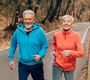 Older couple out jogging