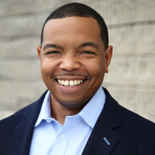 Elliott Holland speaking during a podcast interview about why business buyers fail