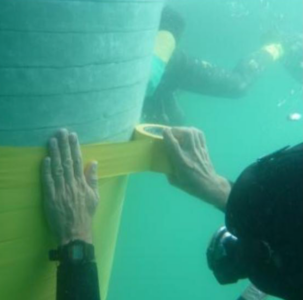 Underwater application of STOPAQ intermediate layer PVC-Yellow. Corrosion prevention impermeable to water and air