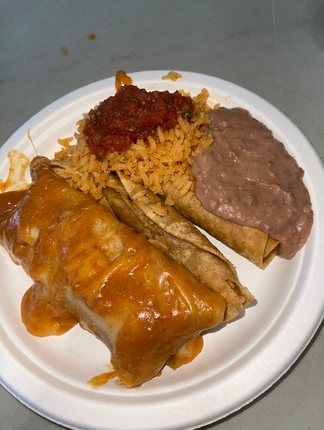 A paper plate of taquitos, enchiladas, rice and beans.