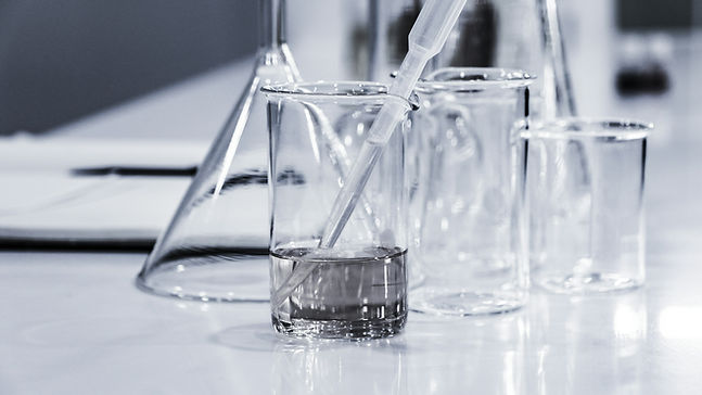 Clear beakers on white table