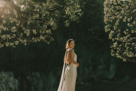 Bride in KYHA gown at Teatre Grec, Barcelona — editorial photography by Riccardo Riccio