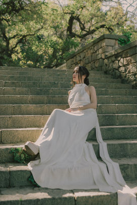 Bride in KYHA gown at Teatre Grec, Barcelona — editorial photography by Riccardo Riccio