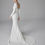 Thumbnail: Pronovias Oropha Crepe Mermaid Wedding Dress with V-Neck and Long Sleeves