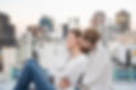 Couple Cuddling on a Rooftop