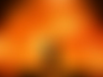 Silhouette of a person stands facing a massive, fiery sun. The room is dimly lit, creating a dramatic and intense atmosphere.