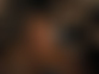 Astronaut in a brown suit looks focused inside a dimly lit spacecraft, surrounded by illuminated panels. Patch reads "GRACE."