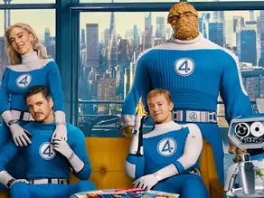 Four people in blue superhero suits, each with a "4" logo, are in a room with city skyline views. One person holds a flaming object.