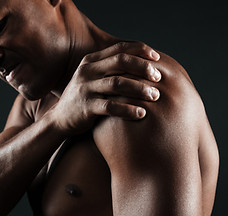 cropped-photo-young-shirtless-afro-american-man-with-shoulder-pain.jpg