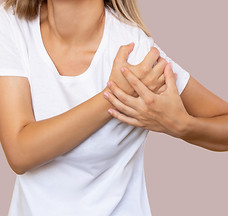 cropped-shot-young-woman-holding-shoulder-her-hands-shoulder-injuries-arm-pain.jpg