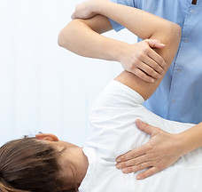 close-up-female-osteopath-doing-shoulder-blade-therapy-young-woman.jpg