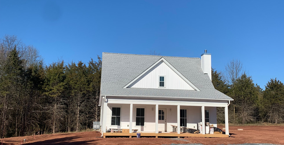 White cottage farmhouse.
