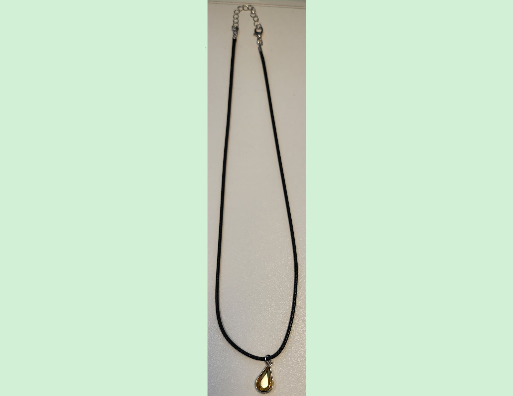 Yellow Teardrop on a Black Cord