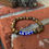 Thumbnail: Evil Eye and Tigers Eye Bracelet