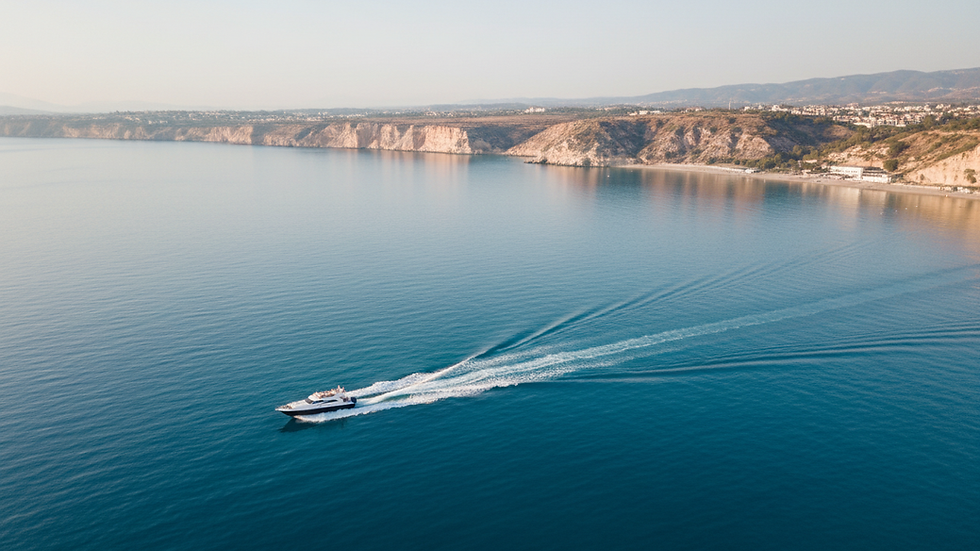 High angle view of a speedboat cutting through clear turquoise water near Marmaris