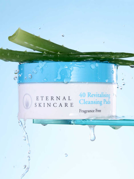 Skincare cleansing pads with aloe vera and water droplets – Sussex product photographer beauty product photography.