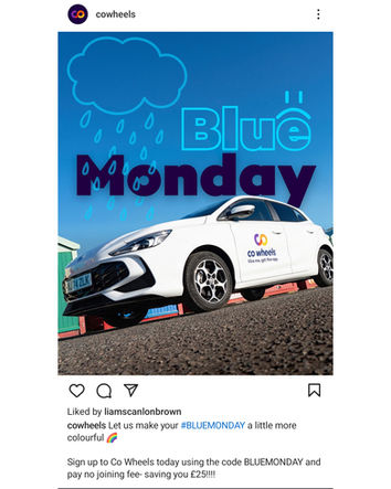 Photograph of Co Wheels car in front of Brighton Beach Huts
