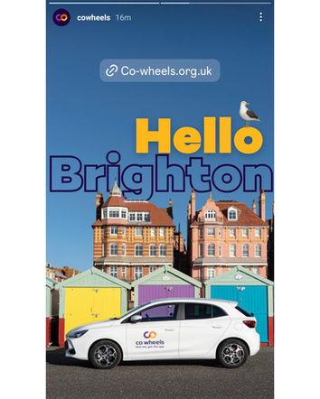 Photograph of Co Wheels car in front of Brighton Beach Huts