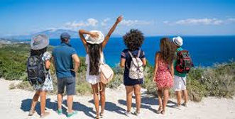 Group of travelers exploring a scenic coastal destination together