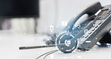 Headset and desk phone with digital communication icons, representing VoIP and seamless business communication solutions.