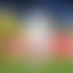 Megan Rapinoe kicking a soccer ball