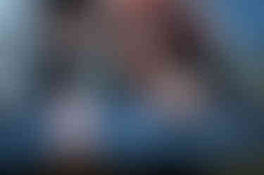 Sam Fox from Better Things sitting in a car with sunglasses on