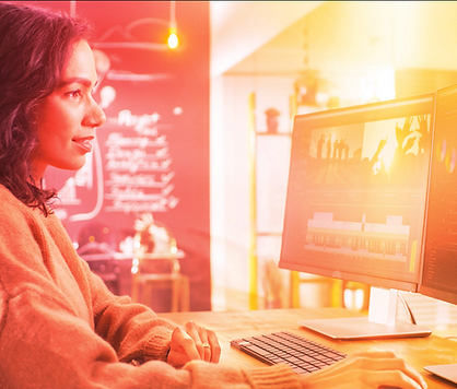 Video editor creating a video on a desktop computer