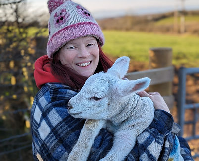 Sarah with a lamb (1).jpg