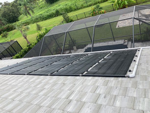 Harness the Power of the Sun: The Benefits of Installing a Solar Pool Heater for Your In-Ground Pool