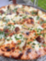 Potato and chive pizza with melted cheese