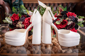 Close up of bride's wedding heels wedding photography at the Out Barn in Clitheroe by Gemma Cullen