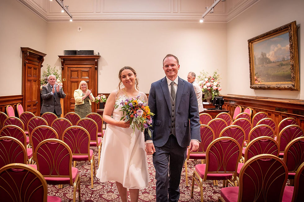 Micro wedding at St George's Hall with couple coming down the aisle