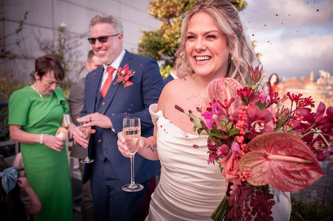 Guests throwing confetti at Hope Street Hotel, Liverpool