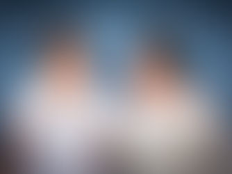 Newlyweds looking at each other in sunglasses in Liverpool