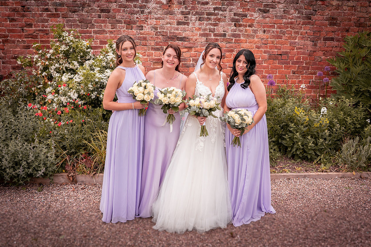 Bride and bridesmaids at Rowton Hall during wedding, photographed by Gemma Cullen, Liverpool wedding photographer