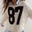 Thumbnail: Cropped Cable-Knit 87 Graphic Sweater