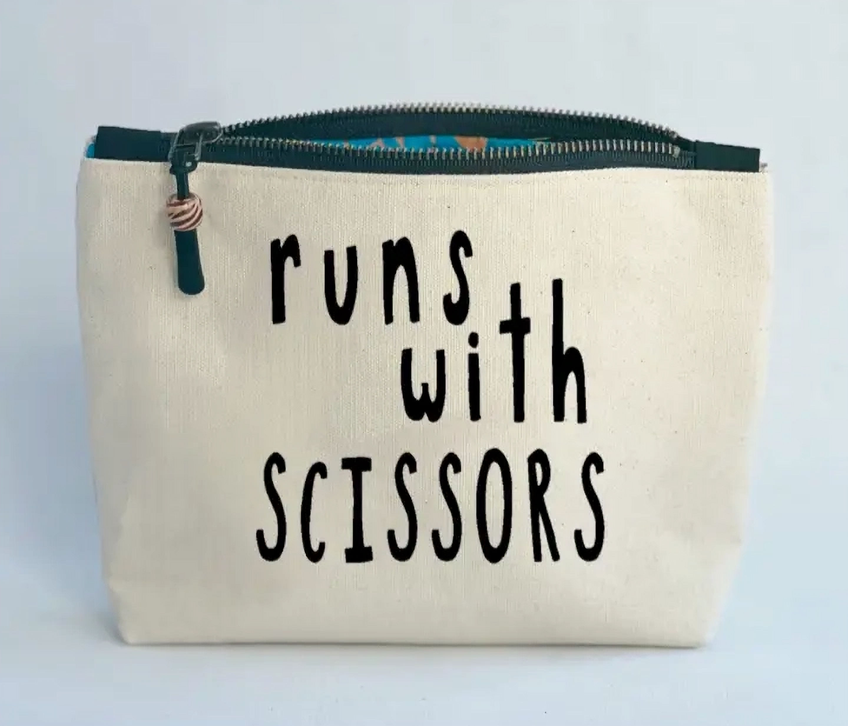 Runs with Scissors Canvas Lined Zip Pouch
