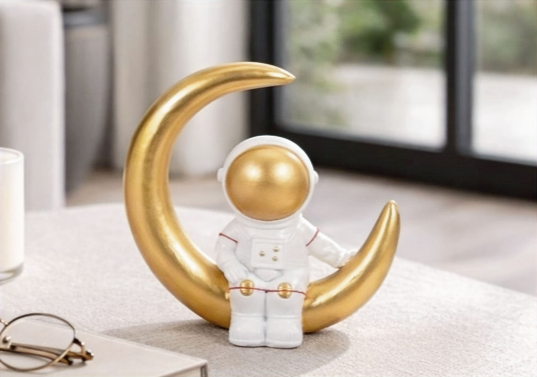 Space Man On Crescent Moon Figurine