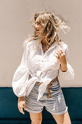 woman wearing white dress shirt and blue