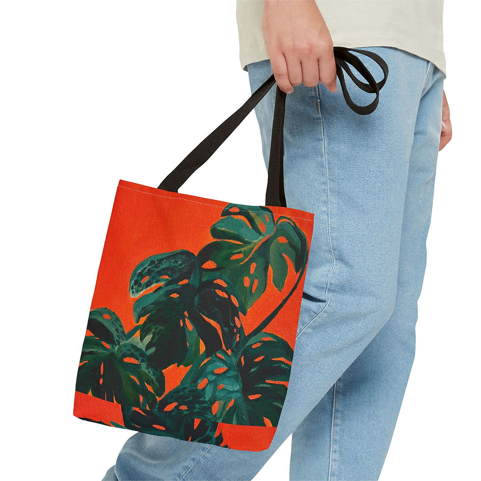 Tote bag with monstera leaf print on orange background