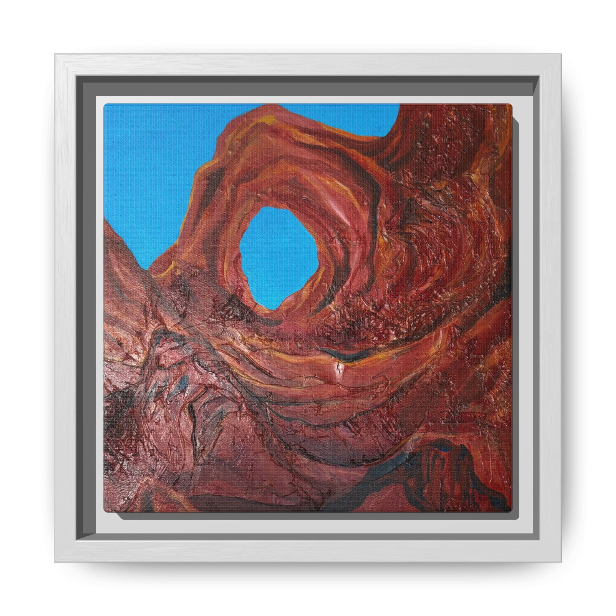 Framed canyon landscape art on a washable rug