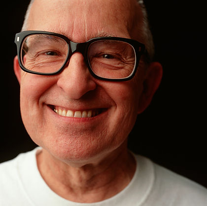 man with glasses smiling