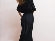 Woman in black tie attire formal gown